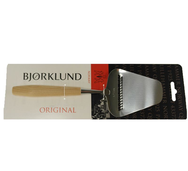 Cheese slicer with grooves